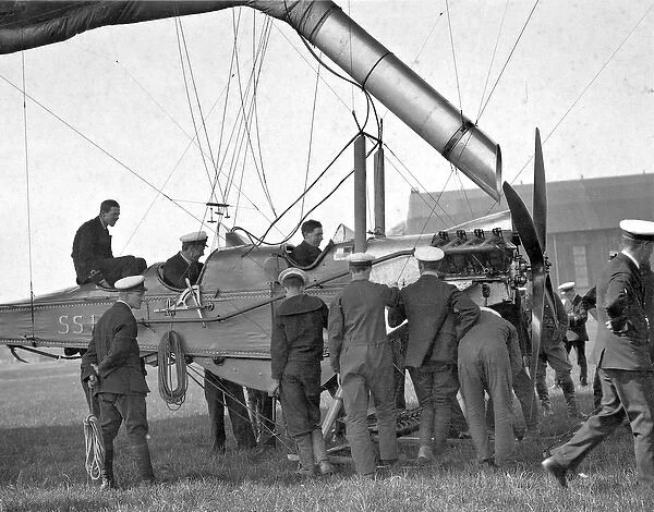 Early British dirigible on the ground with crew