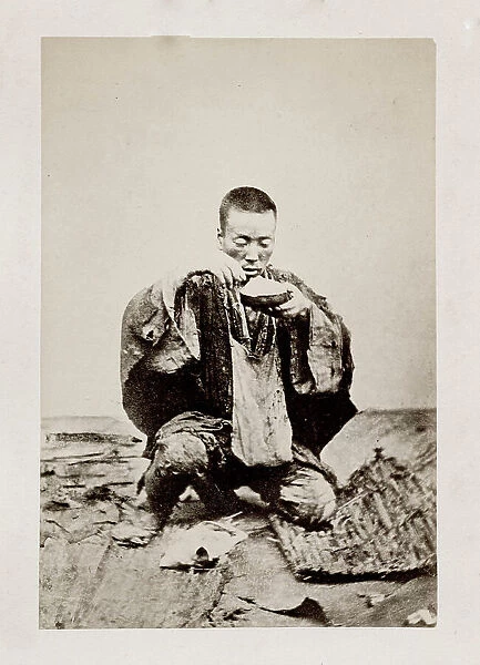 Early Japanese portrait: man eating rice