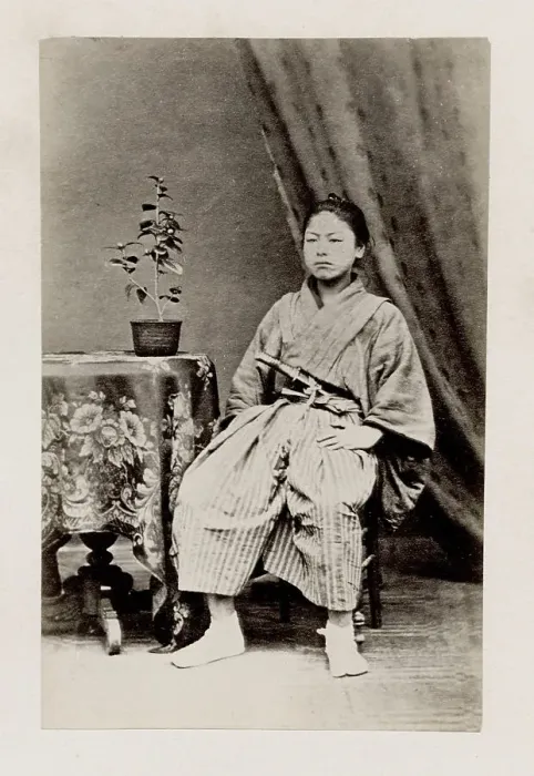 Framed Print : Early Japanese portrait: seated man with sword Framed Print : Early Japanese portrait: seated man with sword