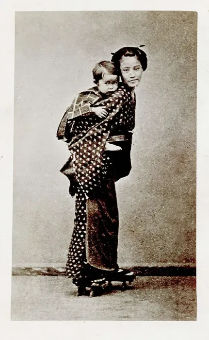 Framed Print : Early Japanese portrait; woman carrying a baby