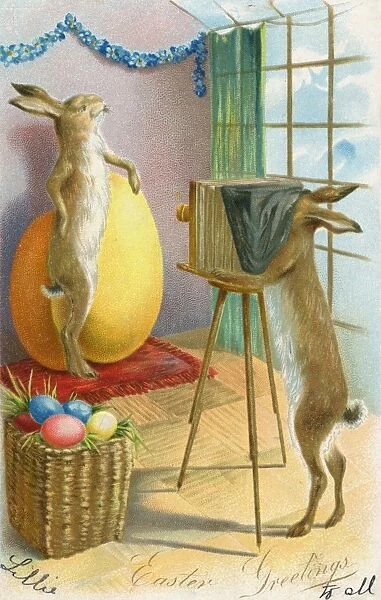 Easter Bunny posing with large egg for a photograph