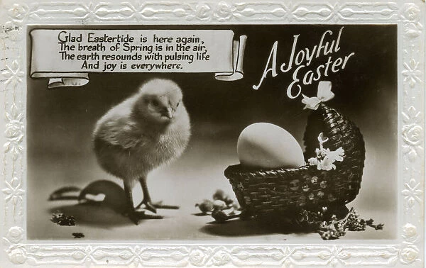 Easter postcard with chick and egg in a basket