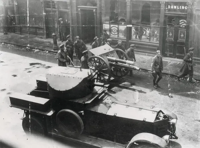 Framed Print : Easter Rising, 1916. Soldiers with gun and armoured car in the streets of Dublin outside Dowling or Dowling's pub. Date: 1916 Framed Print : Easter Rising, 1916. Soldiers with gun and armoured car in the streets of Dublin outside Dowling or Dowling's pub. Date: 1916
