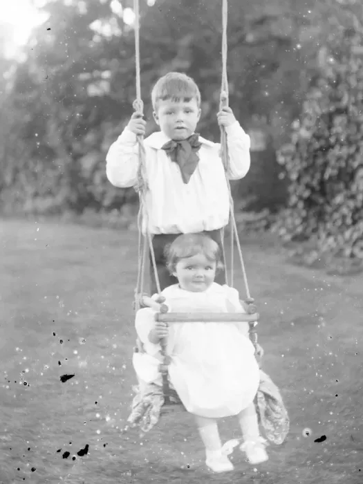 Framed Print : Two Edwardian children on a swing, Mid Wales Framed Print : Two Edwardian children on a swing, Mid Wales