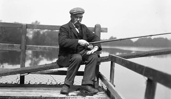 Edwardian man with fishing rod at Ellesmere, Shropshire