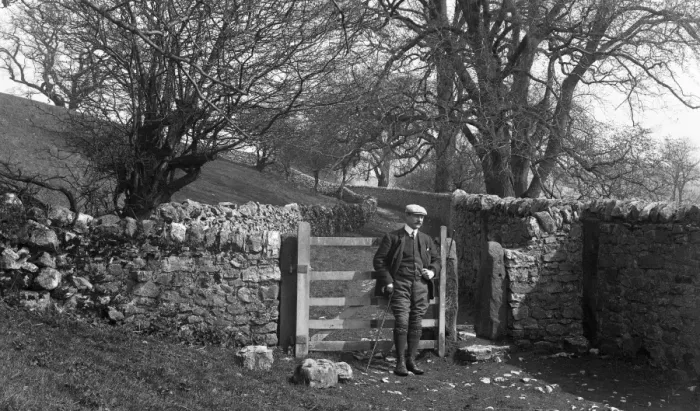Framed Print : Edwardian man at gateway in countryside Framed Print : Edwardian man at gateway in countryside