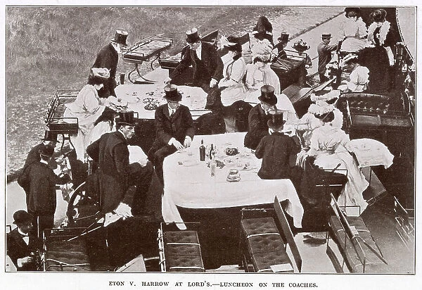 Edwardian men an women sitting on top of the coaches having luncheon, finely laid out with white tablecloths. Date: 1907