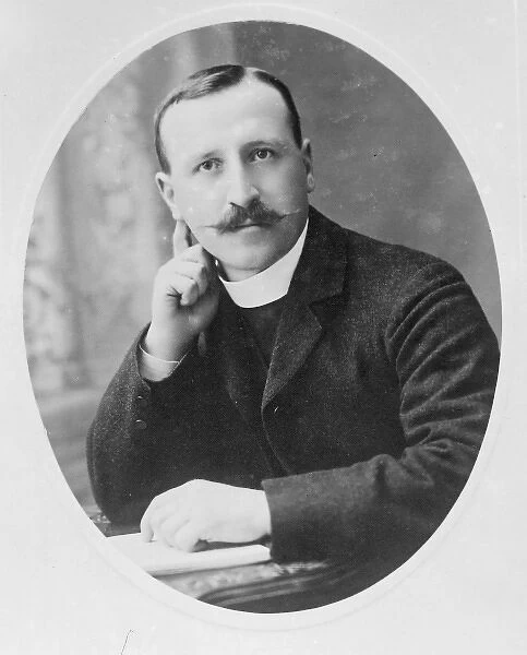 Edwardian vicar in head and shoulders portrait, Mid Wales