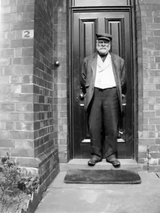 Framed Print : Edwardian workman on his front doorstep, Pembrokeshire