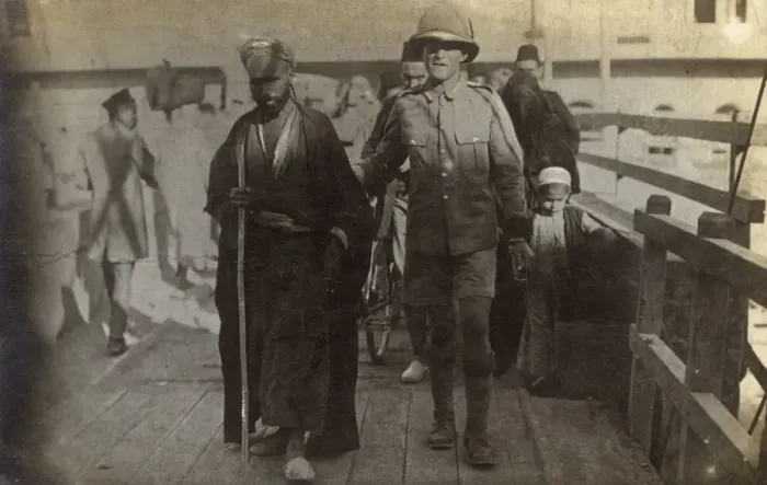 Framed Print : Egypt - British Soldier escorting an old blind Arab man Framed Print : Egypt - British Soldier escorting an old blind Arab man