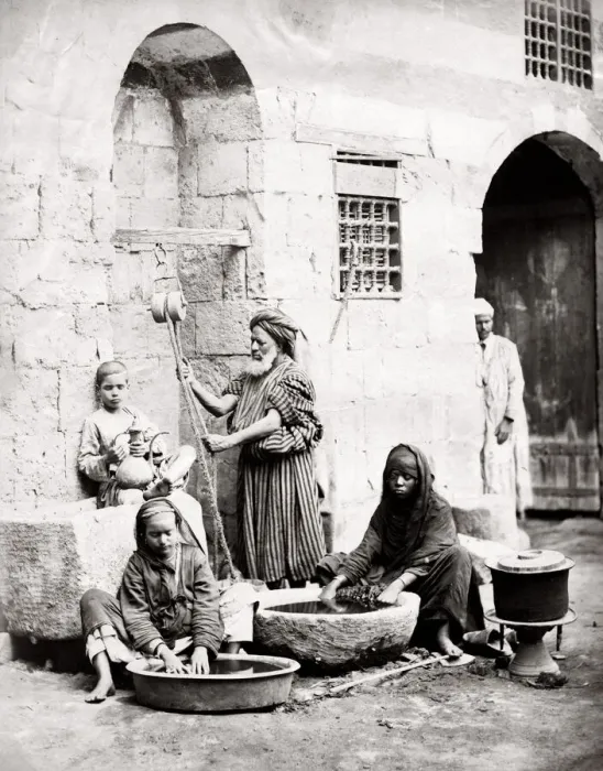 Framed Print : Egypt Cairo - women washing with water from a well Framed Print : Egypt Cairo - women washing with water from a well