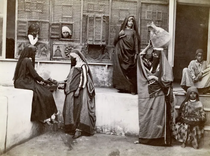 Framed Print : Egypt; interior of a courtyard, veiled women and children Framed Print : Egypt; interior of a courtyard, veiled women and children