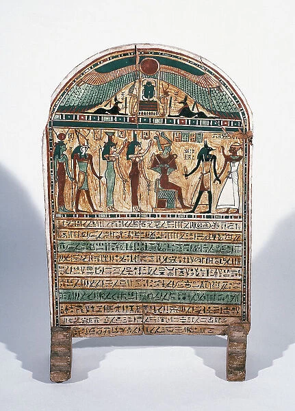 Egypt. Painted wooden stele. The deseased before Osiris