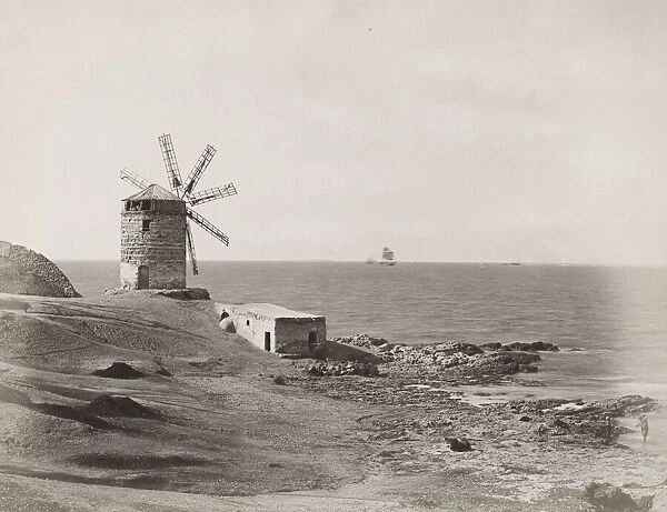 Egypt, windmill on a shore