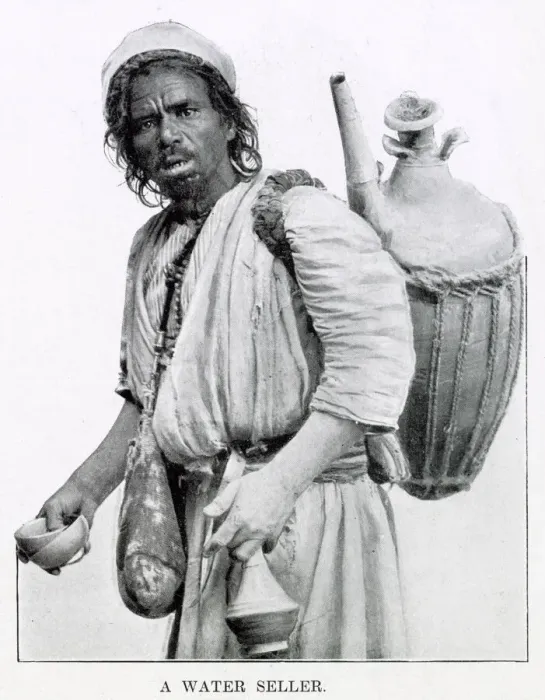 Framed Print : Egyptian man selling water from a clay jug on his back in Cairo, Egypt Framed Print : Egyptian man selling water from a clay jug on his back in Cairo, Egypt