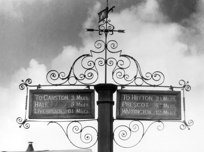 Framed Print : Elaborate wrought iron signposts at Gateacre, Merseyside, England. Date: 1950s Framed Print : Elaborate wrought iron signposts at Gateacre, Merseyside, England. Date: 1950s