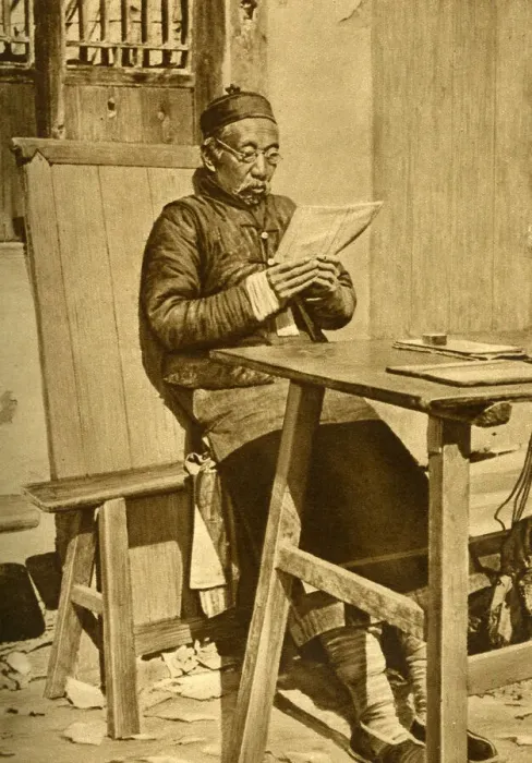 Framed Print : Elderly man reading at a table, Shanghai, China, East Asia Framed Print : Elderly man reading at a table, Shanghai, China, East Asia