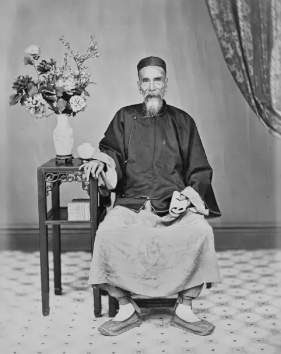 Framed Print : Elderly man seated, China Framed Print : Elderly man seated, China