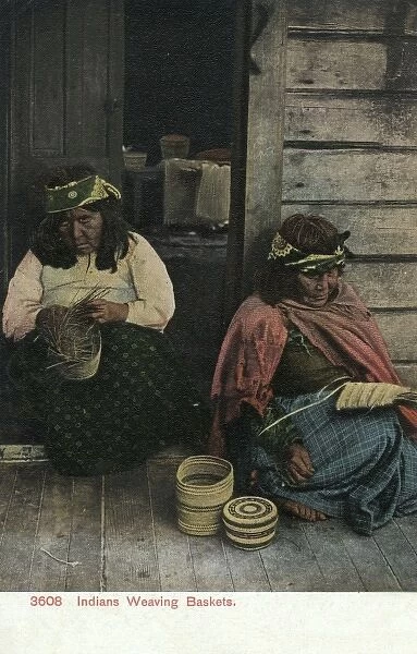Elderly Native American women weaving baskets