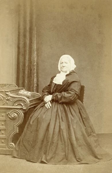 Elderly Victorian woman in a crinoline dress