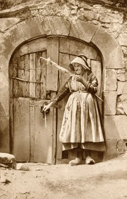 Framed Print : Elderly woman with distaff and spindle, Auvergne, France Framed Print : Elderly woman with distaff and spindle, Auvergne, France