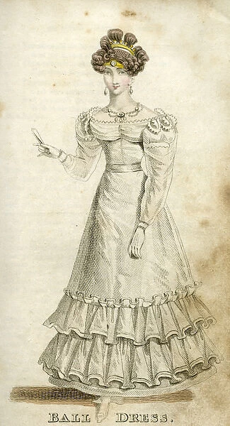 Elegant young woman in a ball dress