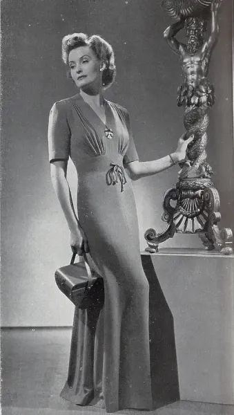 Elizabeth Arden Wool Dinner Dress Print, 1940. Art Prints, Posters & Puzzles from Mary Evans Elizabeth Arden Wool Dinner Dress Print, 1940. Art Prints, Posters & Puzzles from Mary Evans