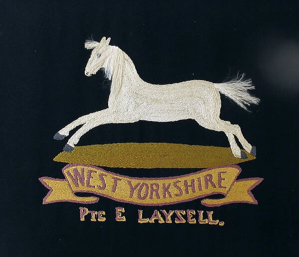 Embroidered badge of the West Yorkshire Regiment