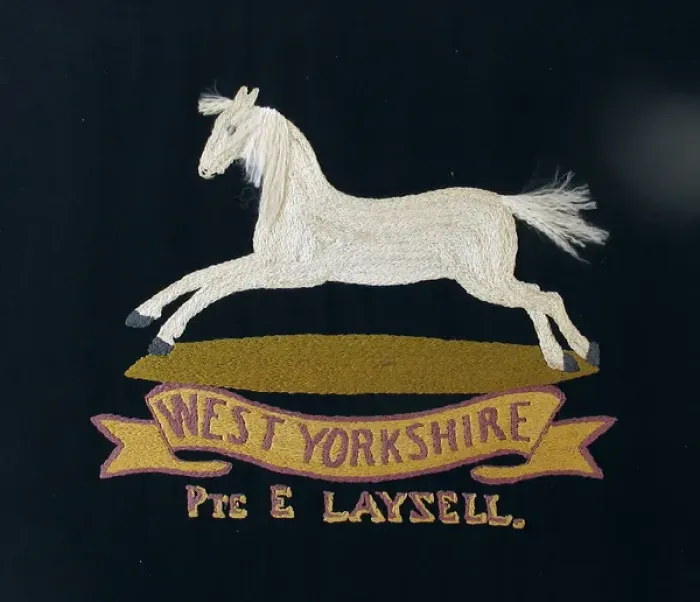 Framed Print : Embroidered badge of the West Yorkshire Regiment Framed Print : Embroidered badge of the West Yorkshire Regiment