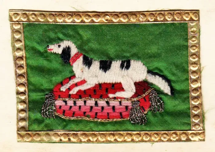 Framed Print : Embroidered dog on a cushion with gold edging Framed Print : Embroidered dog on a cushion with gold edging