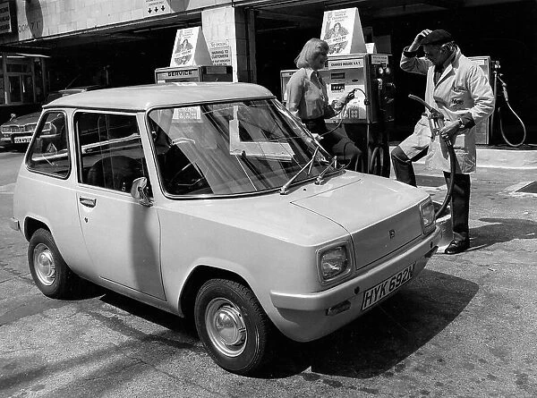 Enfield 8000 Electric Car at a petrol station