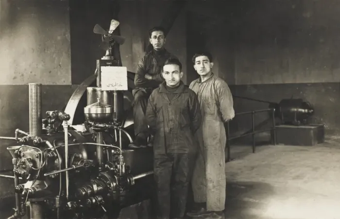 Framed Print : Three Engineers and a large belt-drive Framed Print : Three Engineers and a large belt-drive