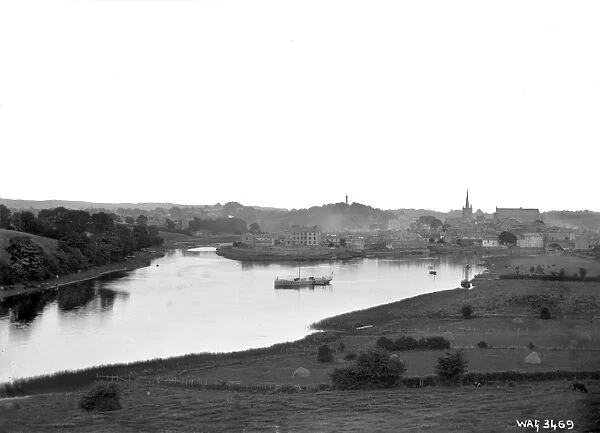 Enniskillen - a panoramic view of the town and Lough with a boat on the lough