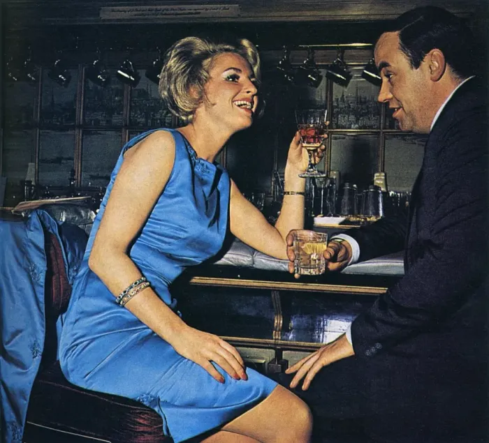Framed Print : Escort sharing a drink with a client