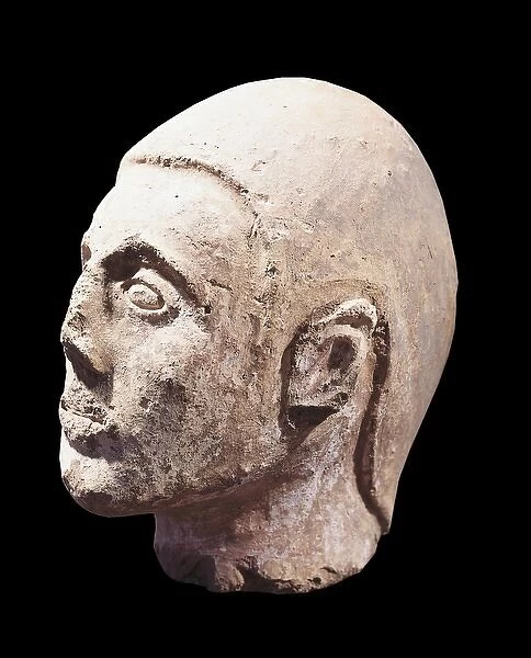 Etruscan antefix. Votive head. 6th c. BC