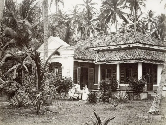 Framed Print : European family outside their colonial bungalow