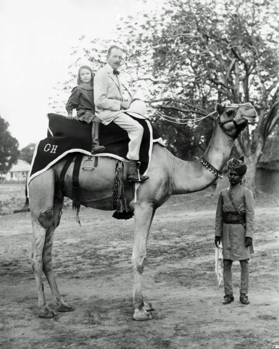 Framed Print : European man and daughter on camel, India Framed Print : European man and daughter on camel, India