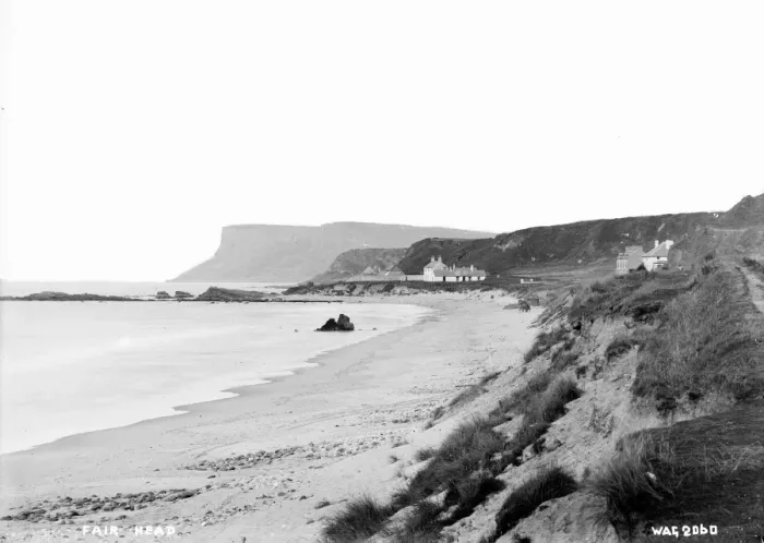 Framed Print : Fair Head - a view along the beach with buildings to Fair Head Framed Print : Fair Head - a view along the beach with buildings to Fair Head