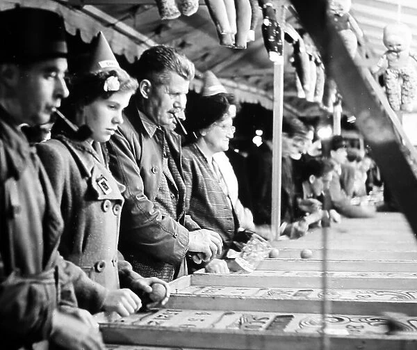 A fairground game, probably 1940s