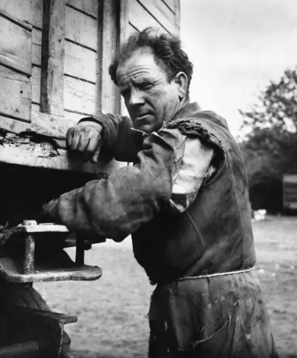 Framed Print : Fairground worker closing lorry before departure Framed Print : Fairground worker closing lorry before departure