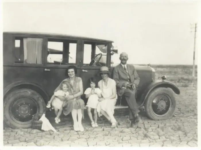 Framed Print : Family and car in the desert, Middle East Framed Print : Family and car in the desert, Middle East