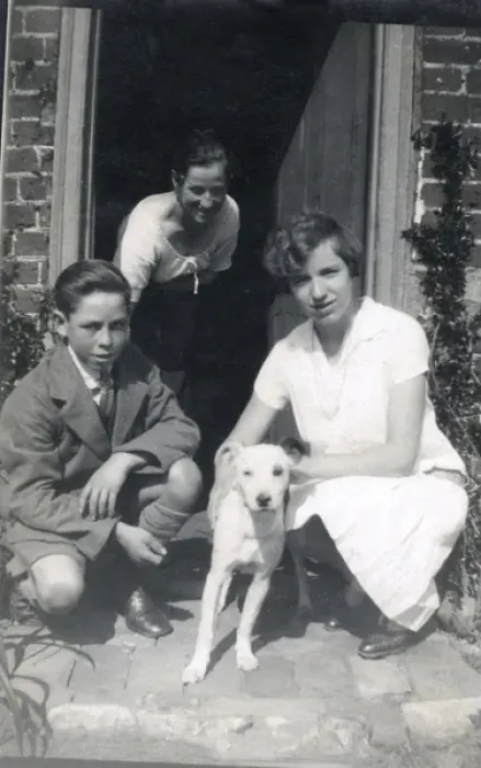Framed Print : Family of three with a dog in a doorway Framed Print : Family of three with a dog in a doorway