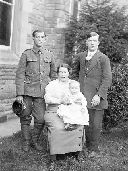 Family group with man in uniform, First World War