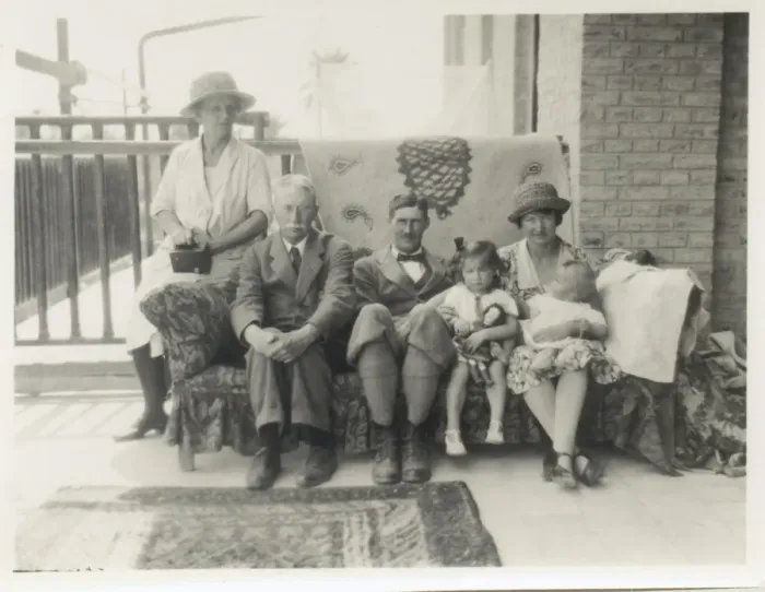 Framed Print : Family group on a sofa on a verandah Framed Print : Family group on a sofa on a verandah