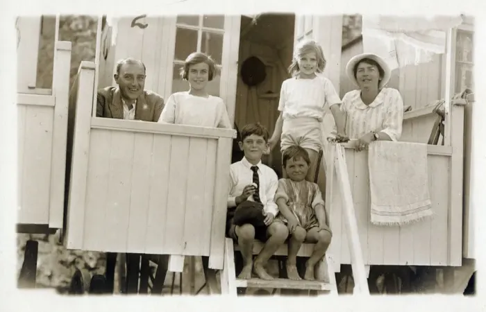 Framed Print : Family outside their beach hut Framed Print : Family outside their beach hut