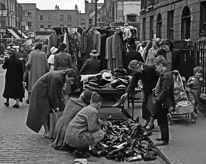 Framed Print : Family sorting shoes in Berwick Street Market, London Framed Print : Family sorting shoes in Berwick Street Market, London
