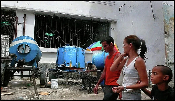Family in street, Havana, Cuba