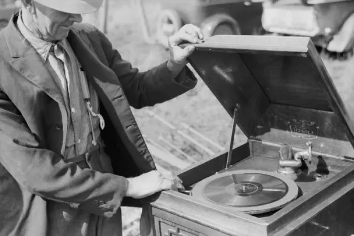 Framed Print : Farmer examining phonograph. Auction near Tenstrike, Minneso Framed Print : Farmer examining phonograph. Auction near Tenstrike, Minneso