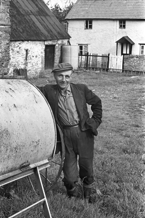 Framed Print : Farmer in farmyard, Herefordshire Framed Print : Farmer in farmyard, Herefordshire