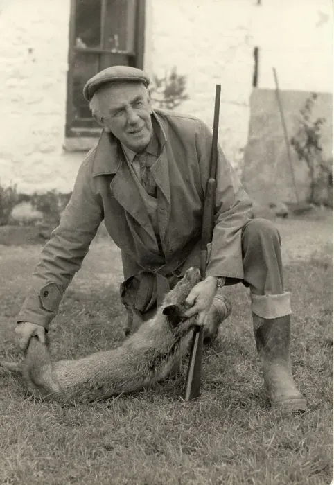 Framed Print : Farmer with fox Framed Print : Farmer with fox